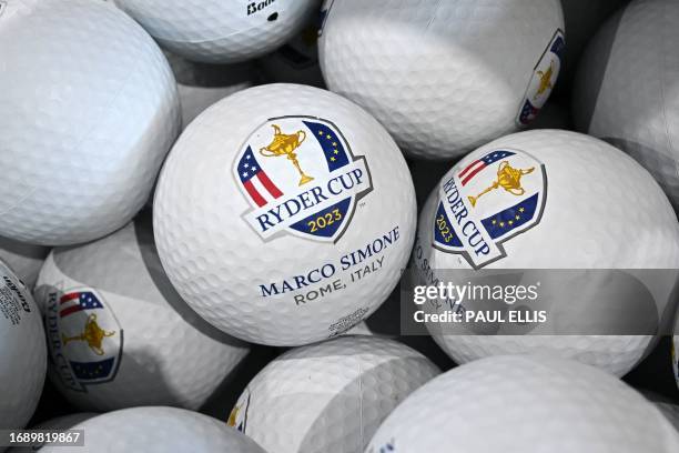 Ryder Cup golf balls are seen on display in the shop ahead of the 44th Ryder Cup at the Marco Simone Golf and Country Club in Rome on September 26,...