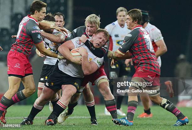 Jacques van Rooyen of the Lions gets tackled during the Vodacom Cup Final match between Steval Pumas and MTN Golden Lions at Mbombela Stadium on May...