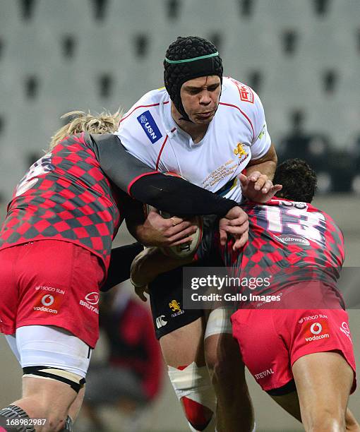 Warren Whiteley of the lions drives into the tackle during the Vodacom Cup Final match between Steval Pumas and MTN Golden Lions at Mbombela Stadium...