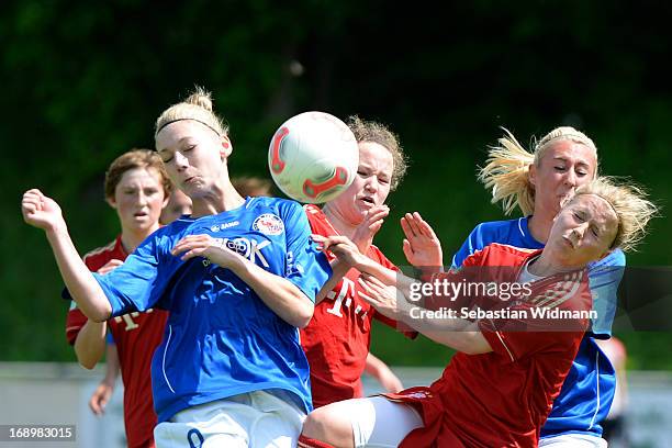 Ricarda Walkling of Muenchen challenges Lara Junge of Potsdam during the B Junior Girls match between Bayern Muenchen and Turbine Potsdam at...