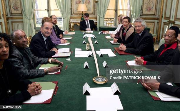 French president Jacques Chirac receives Maryse Conde , president of the Committee for the Memory of Slavery, 30 January 2006 at the Elysee Palace in...