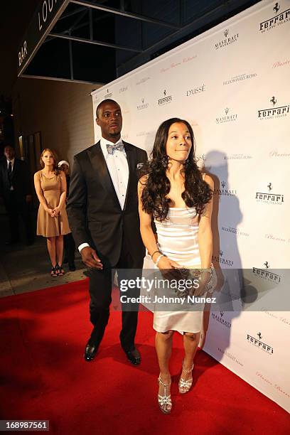 Player Plaxico Burress and wife Tiffany Burress arrive at The Plaxico Burress Collection Launch Event at XVI on May 17 in New York City.