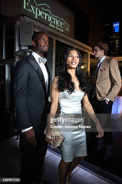 Player Plaxico Burress and wife Tiffany Burress arrive at The Plaxico Burress Collection Launch Event at XVI on May 17 in New York City.