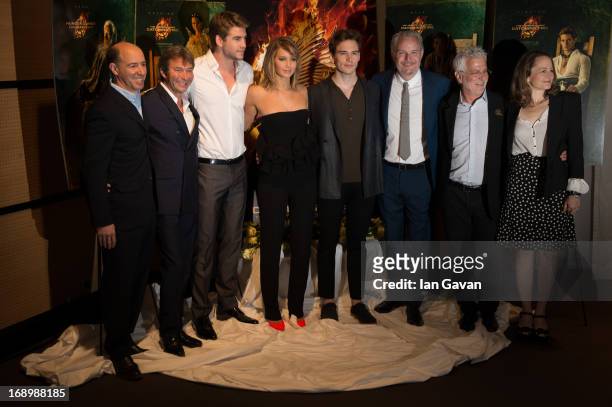 Producer Jon Kilik, Lionsgate Films Co-Chairman Patrick Wachsberger, actor Liam Hemsworth, actress Jennifer Lawrence, actor Sam Claflin and director...