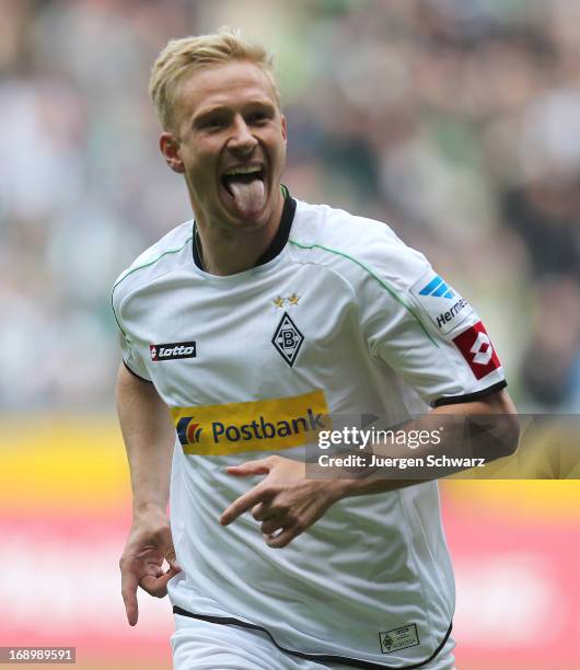 Mike Hanke of Moenchengladbach celebrates after scoring during the Bundesliga match between Borussia Moenchengladbach and Bayern Muenchen at Borussia...