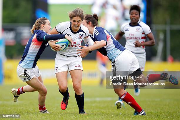 Kimber Rosier of USA breaks through the France defence during the IRB Women's Sevens World Series match between France and USA at the National Rugby...