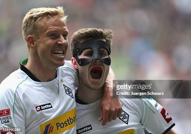 Mike Hanke of Moenchengladbach and Havard Nordveit celebrate after scoring during the Bundesliga match between Borussia Moenchengladbach and Bayern...