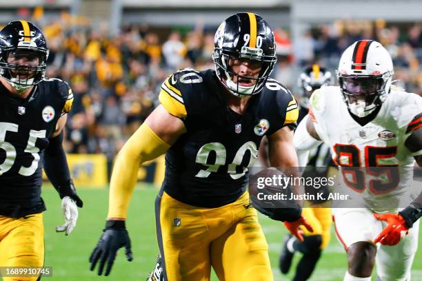 Watt of the Pittsburgh Steelers returns a fumble for a touchdown against the Cleveland Browns during the fourth quarter at Acrisure Stadium on...