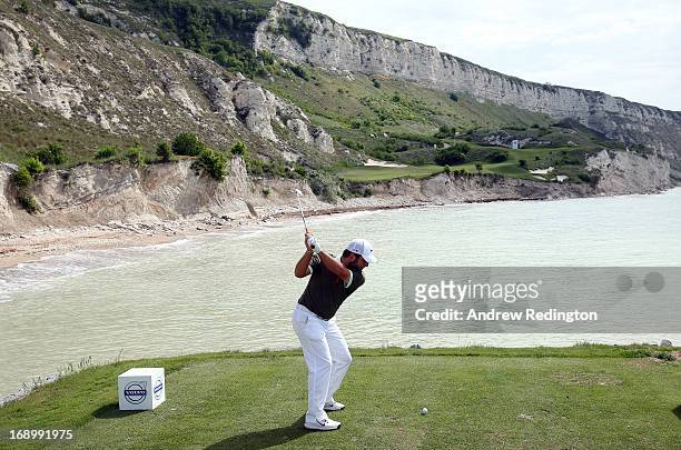 Francesco Molinari of Italy hits his tee-shot on the ninth hole during the last 16 matches on Day Three of the Volvo World Match Play Championship at...