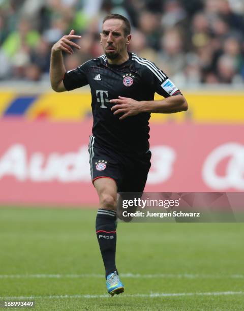 Franck Ribery of Munich celebrates during the Bundesliga match between Borussia Moenchengladbach and Bayern Muenchen at Borussia Park Stadium on May...