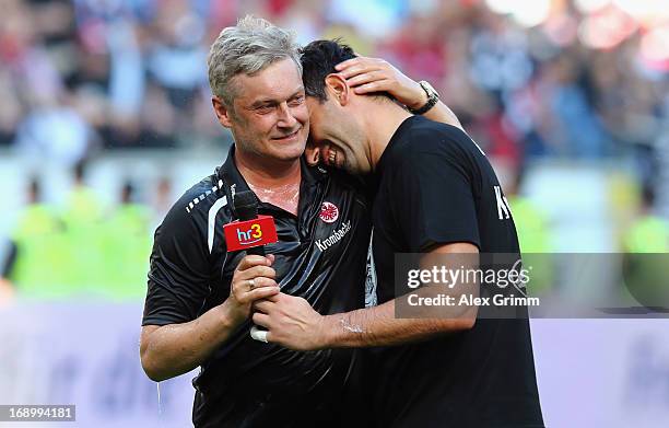 Head coach Armin Veh of Frankfurt hugs goalkeeper Oka Nikolov after the Bundesliga match between Eintracht Frankfurt and VfL Wolfsburg at...