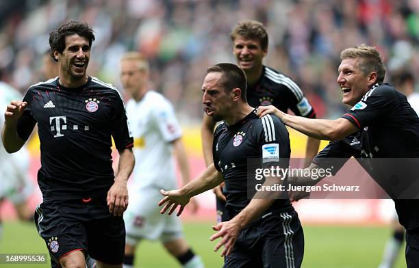 Franck Ribery of Munich celebrates with Bastian Schweinsteiger , Thomas Mueller and Javier Martinez after scoring during the Bundesliga match between...