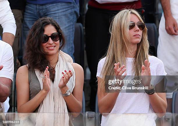 Rafael Nadal's girlfriend Maria Francisca Perello and his sister Isabel Nadal watch him play against Tomas Berdych of the Czech Republic in their...