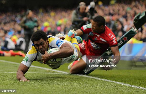 Naipolioni Nalaga of ASM Clermont Auvergne scores the opening try during the Heineken Cup final match between Clermont Auvergne and RC Toulon at the...