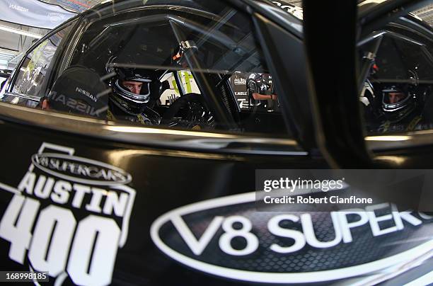 Rick Kelly driver of the Jack Daniel's Racing Nissan sits in his car prior to qualifying for the Austin 400, which is round five of the V8 Supercar...