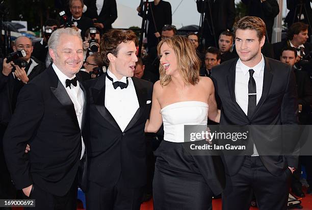 Director Francis Lawrence, Sam Claflin, Jennifer Lawrence and Liam Hemsworth attends "Jimmy P. " Premiere during the 66th Annual Cannes Film Festival...