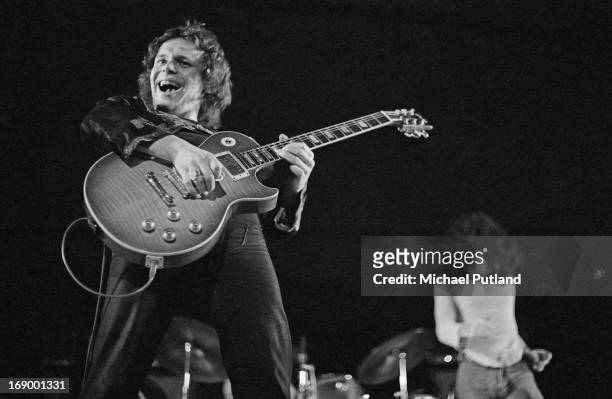 Guitarist Paul Kossoff performing with English rock group Free, at Fairfield Halls, Croydon, London, 12th September 1972. On the right is singer Paul...
