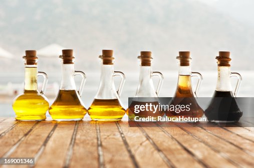 Olive oil and vinegar in bottles Olive oil and vinegar in bottles