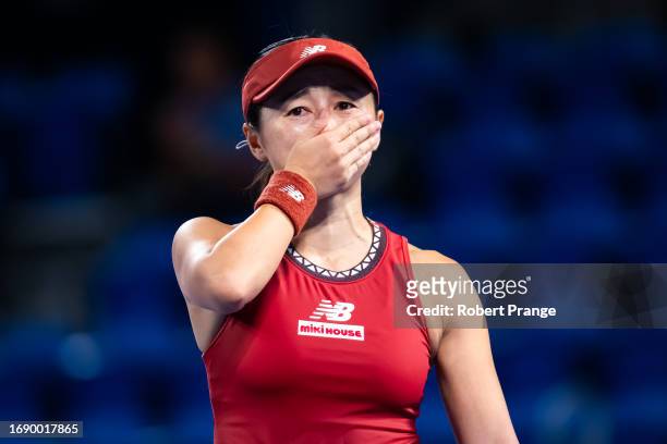 Misaki Doi of Japan reacts to defeating Petra Martic of Croatia in the first round on Day 2 of the Toray Pan Pacific Open at Ariake Coliseum on...