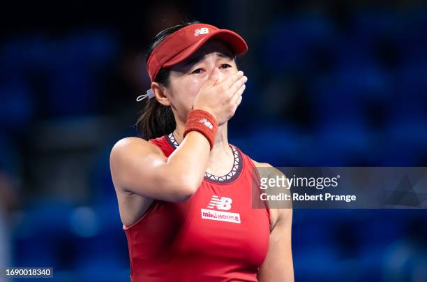 Misaki Doi of Japan reacts to defeating Petra Martic of Croatia in the first round on Day 2 of the Toray Pan Pacific Open at Ariake Coliseum on...