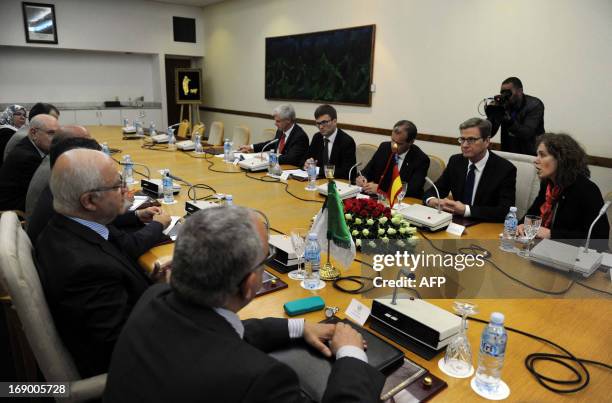 German Foreign Minister Guido Westerwelle and Algerian Foreign Minister Mourad Medelci attend a meeting in the capital Algiers on May 18, 2013. AFP...