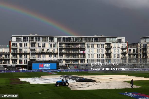 Rainbow appears in the sky following heavy rain falls that will force the third one-day international cricket match between England and Ireland at...