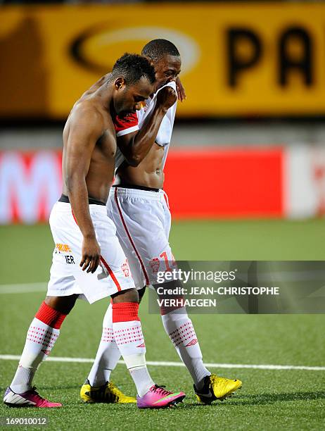 Nancy's French midfielder Lossemy Karaboue and Nancy's Cameroonian forward Paul Alo'o Efoulou react at the end of the French L1 football match Nancy...