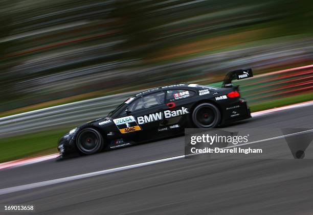 Bruno Spengler of Canada drives the BMW Team Schnitzer BMW M3 DTM during practice for the DTM German Touring Car Championship race at the Brands...