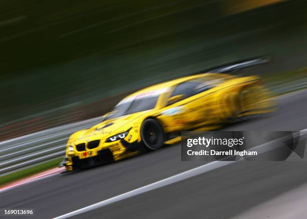 Timo Glock of Germany drives the MTEK Deutsche Post BMW M3 DTM during practice for the DTM German Touring Car Championship race at the Brands Hatch...