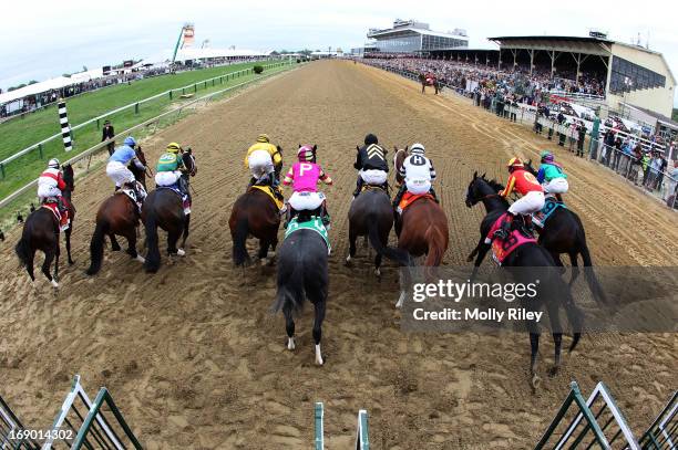 The field breaks the gate at the start of the 138th running of the Preakness Stakes at Pimlico Race Course on May 18, 2013 in Baltimore, Maryland.