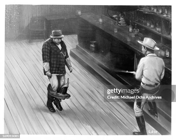 Karel Fiala fires his gun at a man that has his pants pulled down in a scene from the film 'Lemonade Joe', 1964.