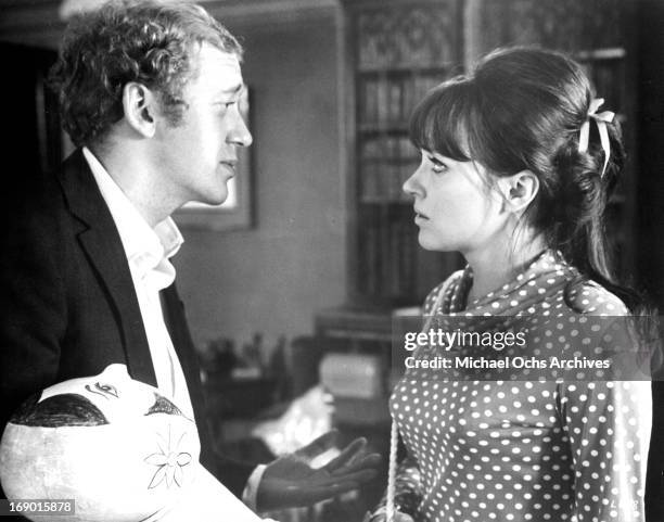 Anna Karina and Nicol Williamson looking at one an other with concern in a scene from the film 'Laughter in the Dark', 1969.