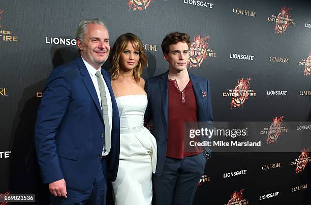 Francis Lawrence, Jennifer Lawrence and Sam Claflin attend a party for 'The Hunger Games: Catching Fire' at The 66th Annual Cannes Film Festival at...