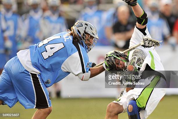 Greg Bice of the Ohio Machine gets his stick up around the neck of Kevin Unterstein of the New York Lizards in the first period on May 18, 2013 at...