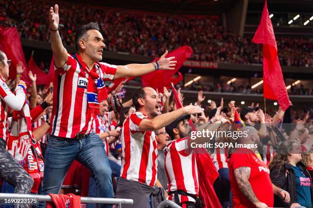 Atletico Madrid fans seen cheering during the LALIGA EA SPORTS 2023/24 football match between Atletico Madrid and Real Madrid at Cívitas...