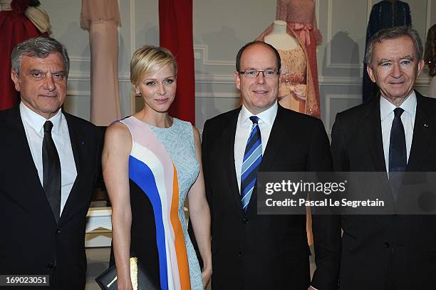 Sidney Toledano, Princess Charlene of Monaco, Prince Albert II of Monaco, and LVMH CEO Bernard Arnault attend the Dior Cruise Collection 2014...