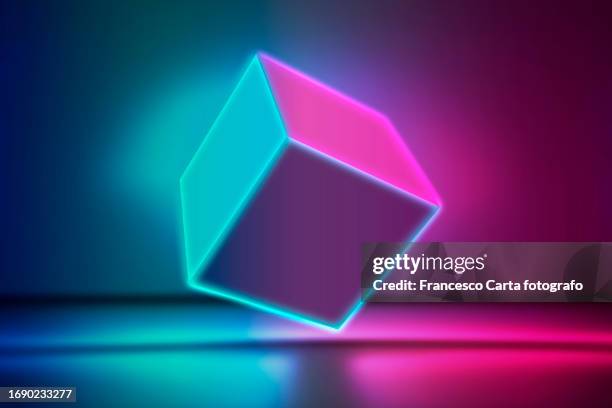 neon lights cube in mid-air - glowing cube stock pictures, royalty-free photos & images