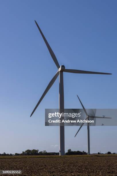 The onshore wind turbines of Little Cheyne Court Wind Farm owned by RWE on the 25th of September 2023 in Romney Marsh, United Kingdom. There are 26...