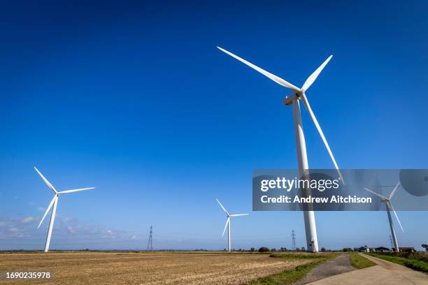 The onshore wind turbines of Little Cheyne Court Wind Farm owned by RWE on the 25th of September 2023 in Romney Marsh, United Kingdom. There are 26...