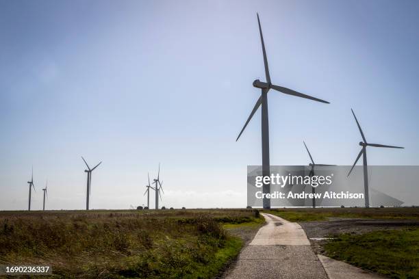 The onshore wind turbines of Little Cheyne Court Wind Farm owned by RWE on the 25th of September 2023 in Romney Marsh, United Kingdom. There are 26...