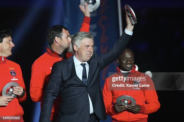 Carlo Ancelotti and Claude Makelele of Paris Saint-Germain celebrate after defeating Stade Brestois 29 at the French League 1 match at Parc des...