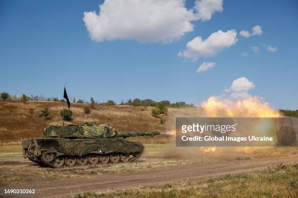 Ukrainian Leopard 1 battle tank fires at the test site on September 18, 2023 in Ukraine. Ukraine got tanks as part of international military...