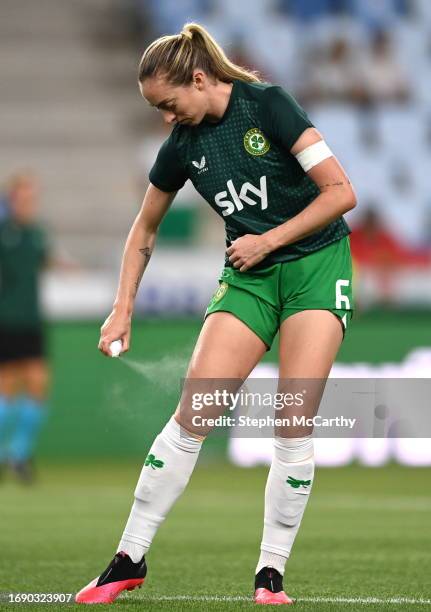 Budapest , Hungary - 26 September 2023; Megan Connolly of Republic of Ireland sprays insect repellent before the UEFA Women's Nations League B1 match...