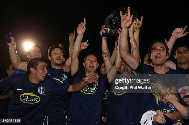 Auckland celebrate with the OFC Champions League trophy following the OFC Champions League Final match between Auckland and Waitakere at Mt Smart...