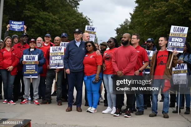 President Joe Biden joins a picket line with members of the United Auto Workers union at a General Motors Service Parts Operations plant in...