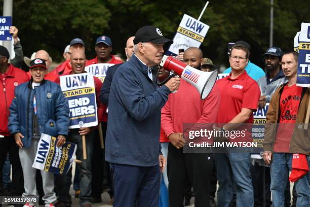 President Joe Biden addresses a UAW picket line at a General Motors Service Parts Operations plant in Belleville, Michigan, on September 26, 2023....