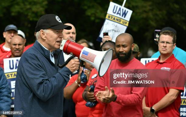 President Joe Biden addresses a UAW picket line at a General Motors Service Parts Operations plant in Belleville, Michigan, on September 26, 2023....