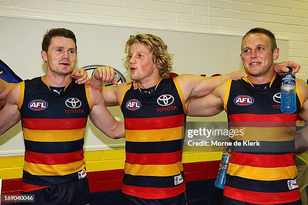 Patrick Dangerfield, Rory Sloane and Brent Reilly of the Crows celebrate after the round eight AFL match between the Adelaide Crows and the St Kilda...