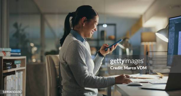 phone, night and business woman on social media typing, texting and search internet for meme in a company office. internet, online and laughing employee chatting for connection on mobile app - meme text stock pictures, royalty-free photos & images