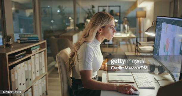 night, business woman and graphic designer on computer in office at table working on deadline. creative, serious and professional at desk, editing software and retouching project online in startup. - graphic designer stock pictures, royalty-free photos & images